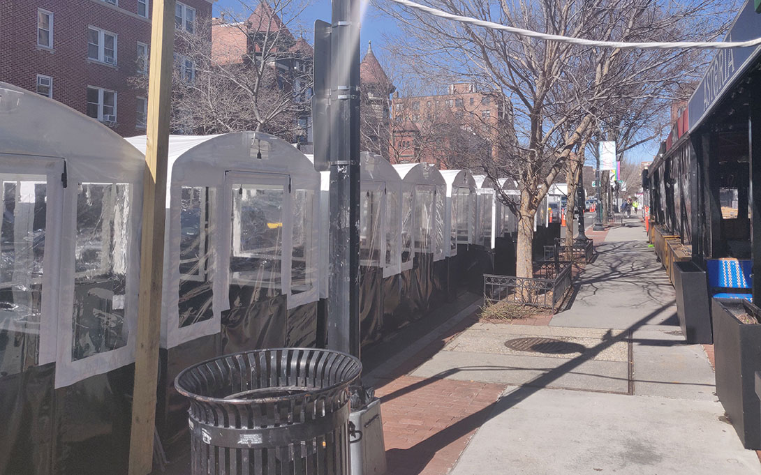 Enclosed tents for dining on a city street