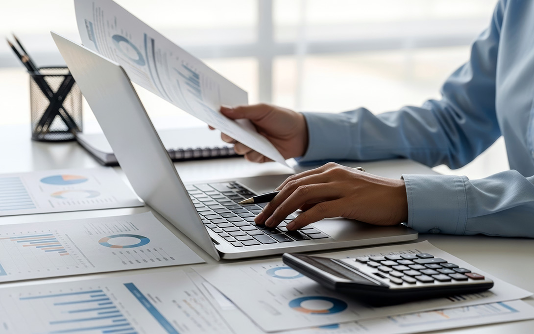 Woman working on budgeting spreadsheet